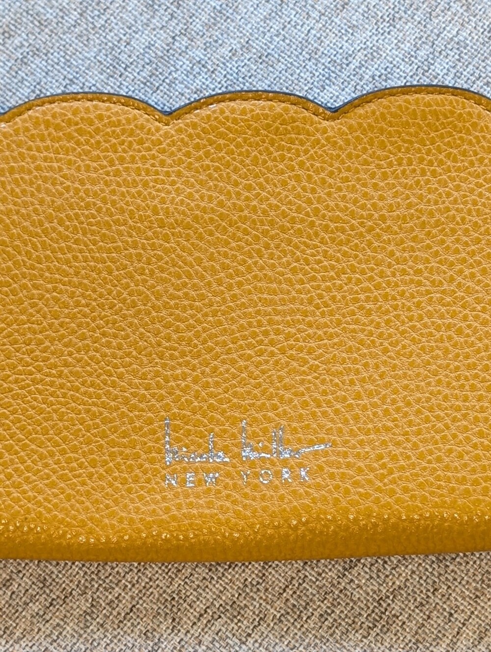 Nicole Miller Orange Scalloped Leather Wallet